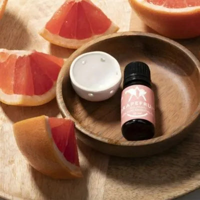 Saunum Sauna Aromaöl Set mit Grapefruitöl, Schale und frischen Grapefruitstücken
